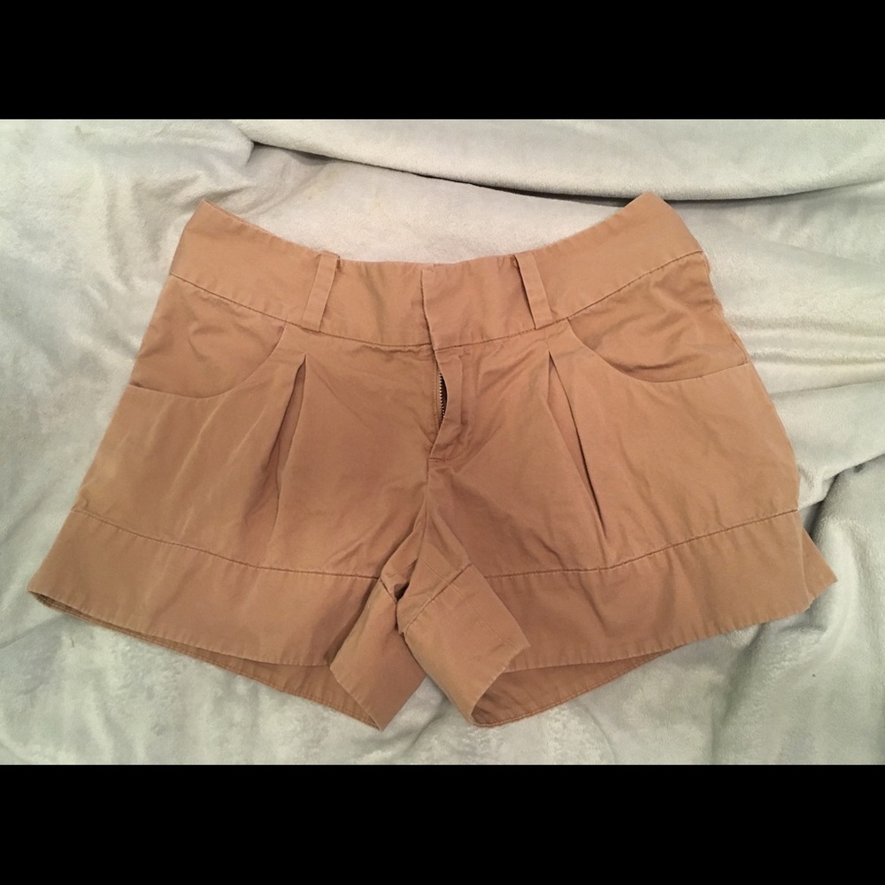 Chino pleated shorts in tan. Size 4.